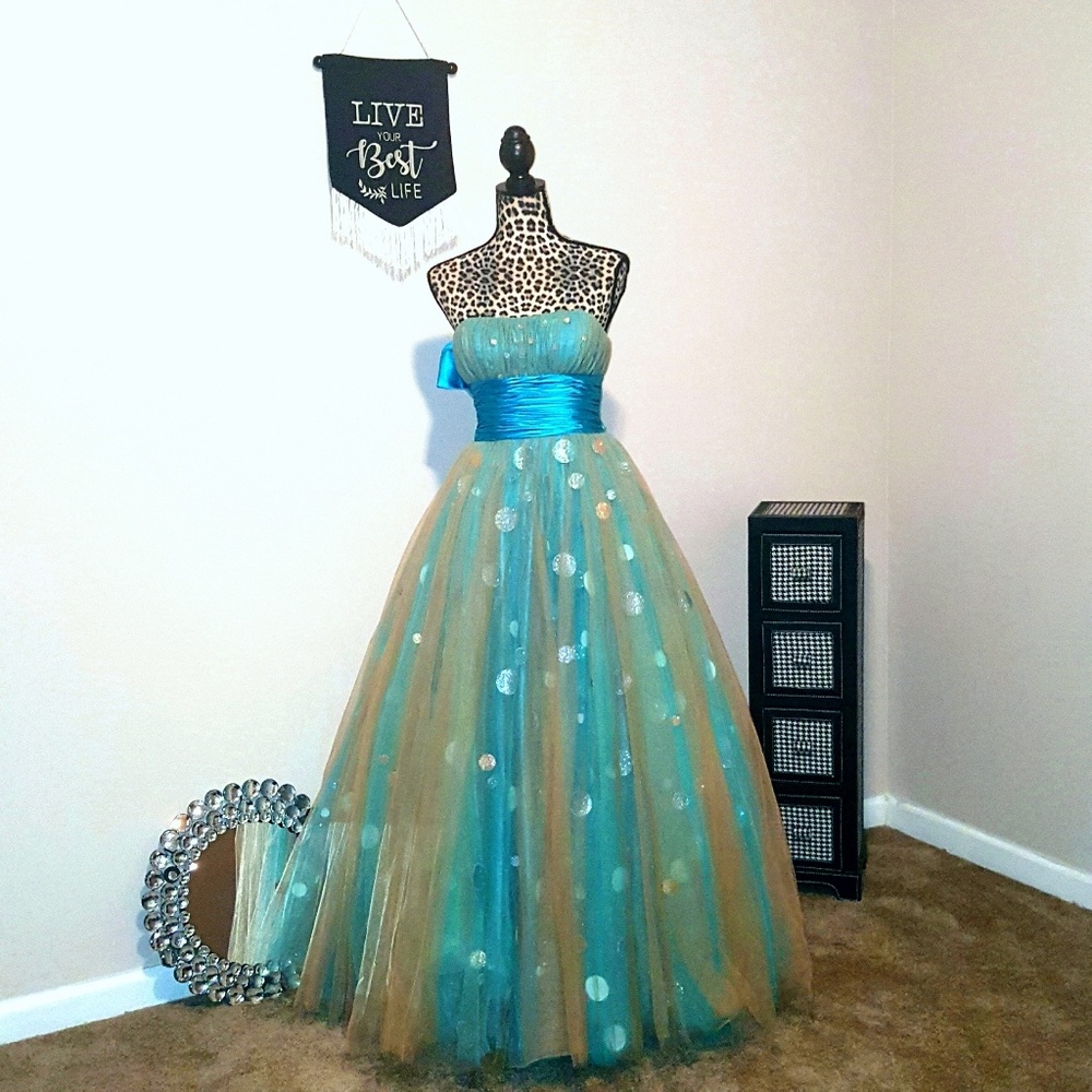 Blue, gold, and silver used prom dress